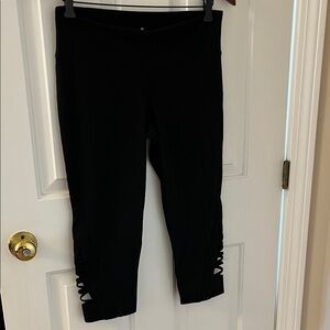 Athleta Black Cropped Leggings with Cutout Detail. Size M. Like new